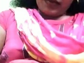 Transvestite Tamil woman shows off her breasts on video chat