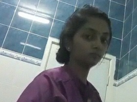 Indian nurse's solo nude video in a conference room