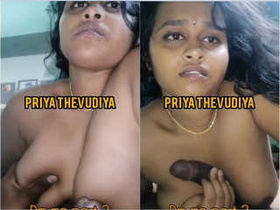 Watch as a Tamil girl pleases you with her hands