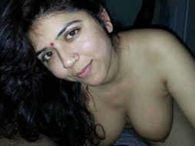 Sexy teenage beauty shows off her curves in the car