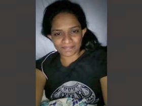 A stunning Sri Lankan woman pleasuring herself with her hands