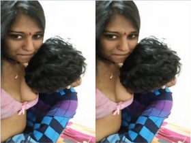 Indian girl records herself sucking her own boobs