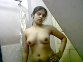 Indian girl flaunts her big boobs and pussy in the bathroom