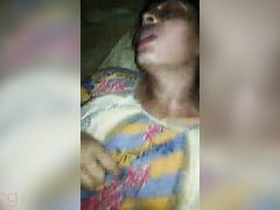 Indian housewife's moans of sexual pleasure during threesome with husband's friend