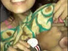 Girlfriend's big tits squeezed tightly by her lover