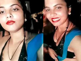 Mature Desi woman flaunts her busty cleavage while shaking her hips