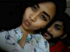 Busty Indian babe gives her cousin a titjob and gets fucked