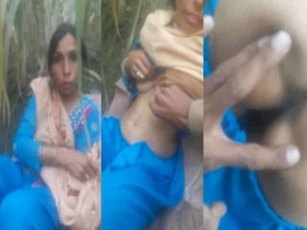 Desi aunty flaunts her ass to her lover in a public place