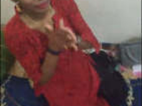 A woman from India flaunts her breasts