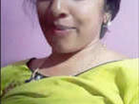 Aunt Mallu flaunts her big tits in this video