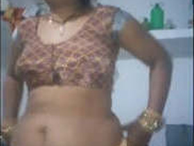 Indian wife flaunts her breasts and vagina