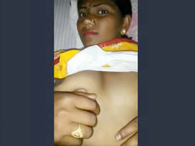 Bhabhi's big tits pressed by her lover's hands