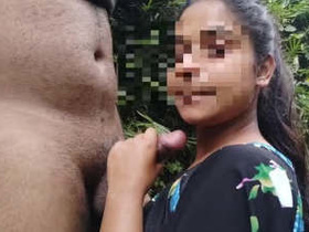 Tamil girl gives blowjob in the open air and gets swallowed