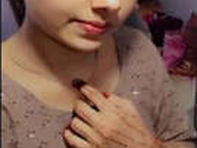 VK, a stunning Desi beauty, flaunts her ample bosom with her partner