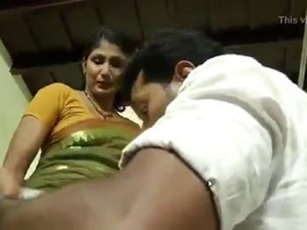 A Tamil sex padams featuring a young man rubbing his breasts