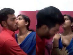 Indian girlfriend sucking boobs at a cyber cafe