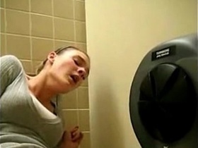 Experience the ultimate orgasm in this bathroom masturbation video