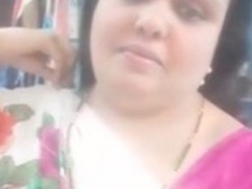 Chubby MILF's big boobs and pussy on display in saree
