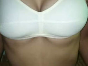 Desi Indian girl in white bra flaunts her hot body