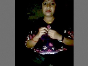 Watch a stunning Bhabhi pleasure herself with her fingers in this steamy video