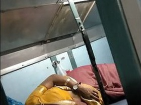 Indian bhabhi reveals her breasts on a train