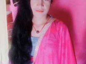 A pretty Indian girl in traditional dress after taking a bath