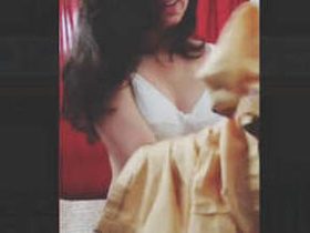 A cute desi girl gets naked for her lover in a steamy video