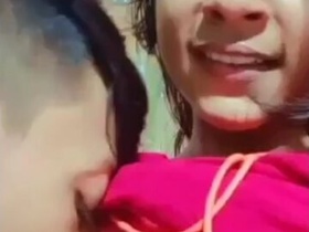 Teen with cute boobs giving blowjob to guy in village