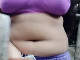 Akhi reveals her breasts and intimate parts in the bathroom