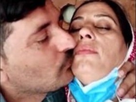 A Pakistani aunt and her neighbor uncle engage in romantic activities