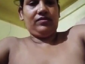Desi aunty from the village pleasures herself with her fingers