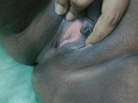 Desi aunty gives herself a handjob and teases with her wet pussy