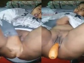Tamil girl gets super horny and shows off her carrot-masturbation skills