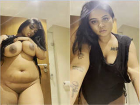 Indian beauty Oasi shows off her big boobs and masturbates