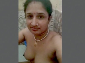 Desi hottie takes a bath and gets naked
