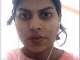 A cute Indian girl flaunts her big boobs in a video