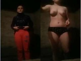 A cute desi girl strips down and reveals her boobs and pussy in exclusive video