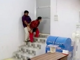 Caught in the act: A couple gets naughty in the office