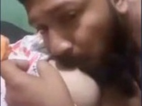 Indian girlfriend enjoys having her boobs sucked