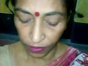 Desi aunt gives her son's friend a blowjob
