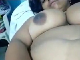 Mature Indian woman pleasures herself