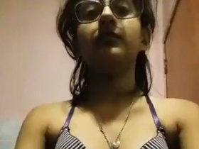 Extremely cute Indian girl strips down to nothing