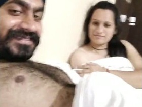 Sardarji and his girlfriend in a hotel room