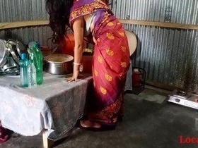 Official video of cute boudi in red sari having sex