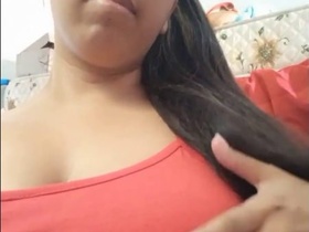 Baamini, the Indian girl with huge breasts, bares them