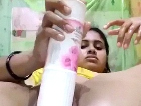 Watch Desi girl use a bottle of air freshener as a sex toy