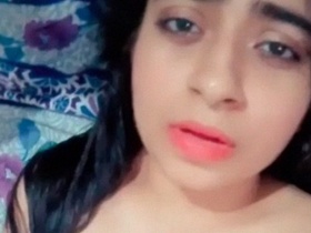 Desi girl masturbates with her fingers in this hot MMS video