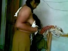 Desi Aunty's Home with a Young Neighbor - Free Indian Sex Video